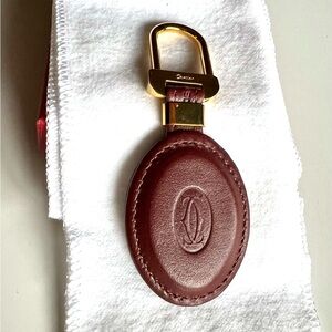 Cartier Bordeaux Leather Key Holder with Gold Accent